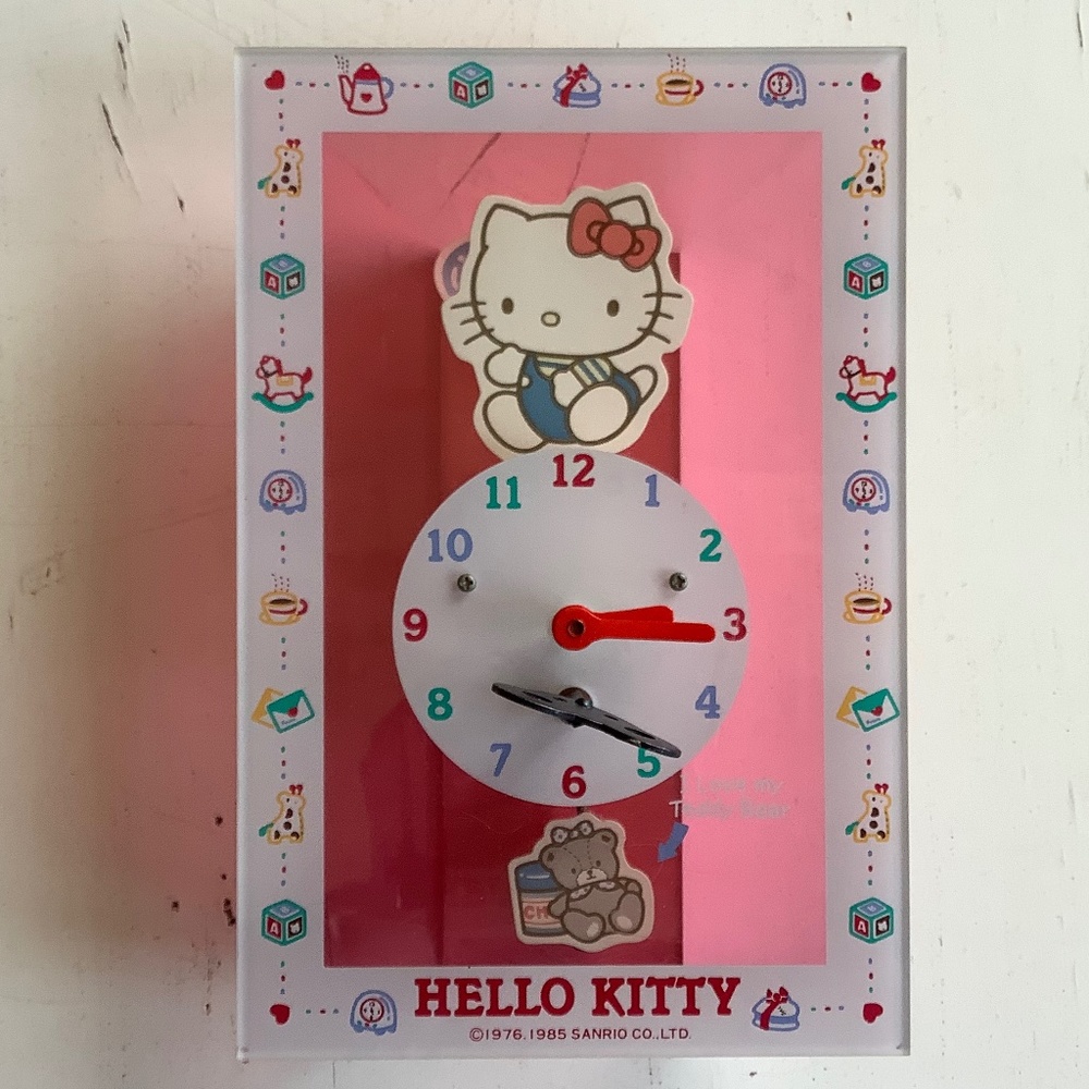 Vintage Sanrio Hello Kitty wind up clock **Does not work ***